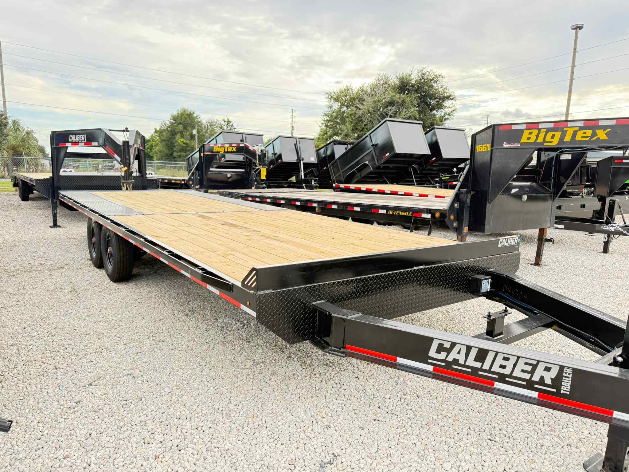New 8.5×24 CALIBER Flatbed Trailer