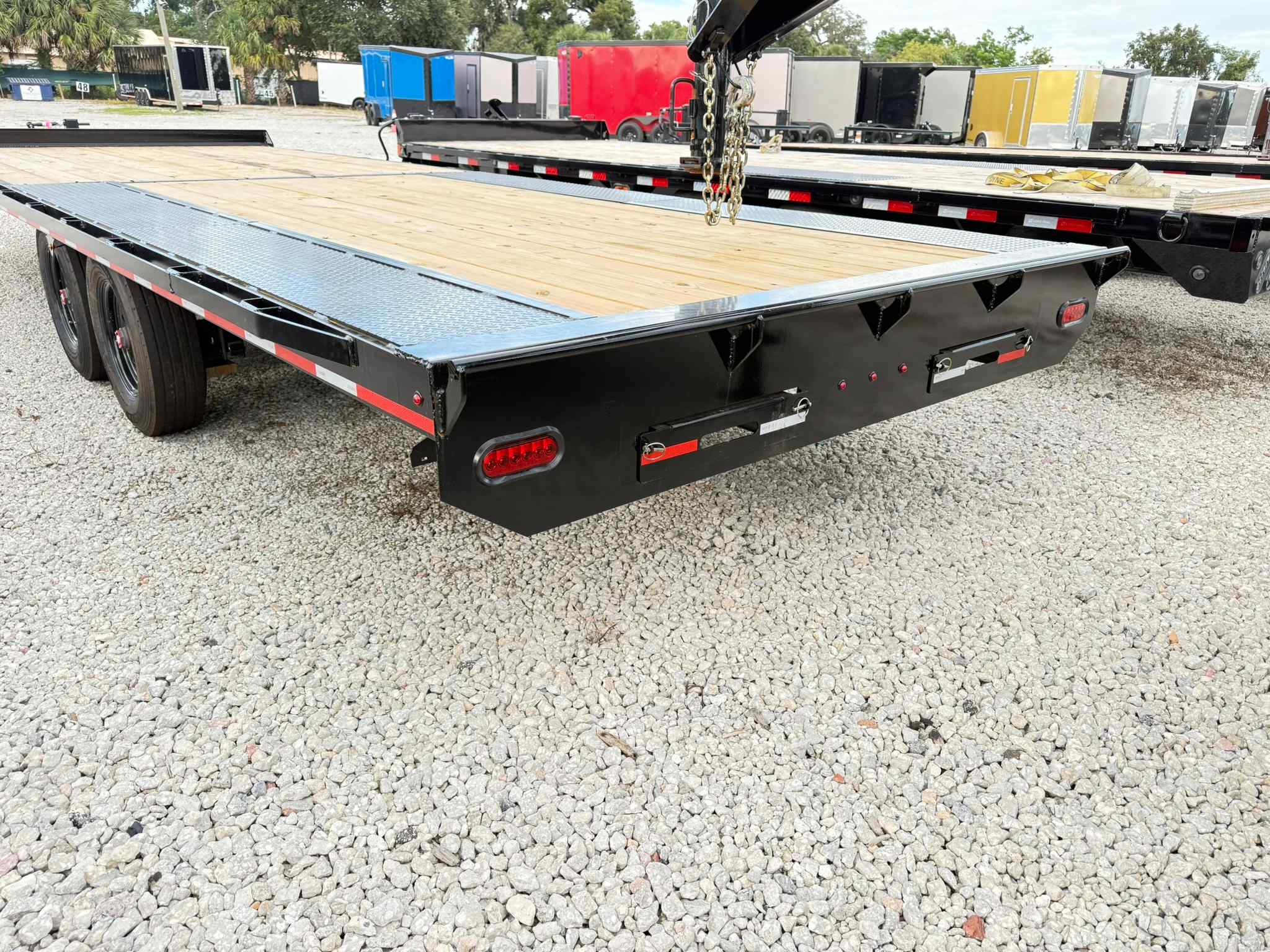 New 8.5×24 CALIBER Flatbed Trailer