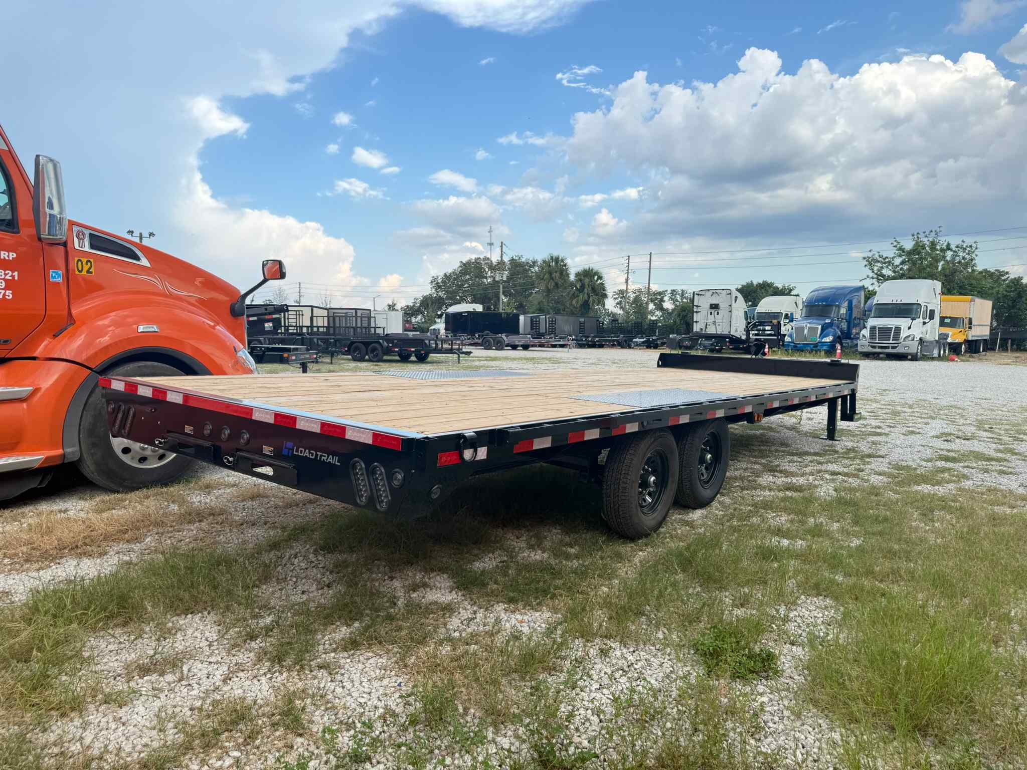 New 8.5×24 LOAD TRAIL Flatbed Trailer