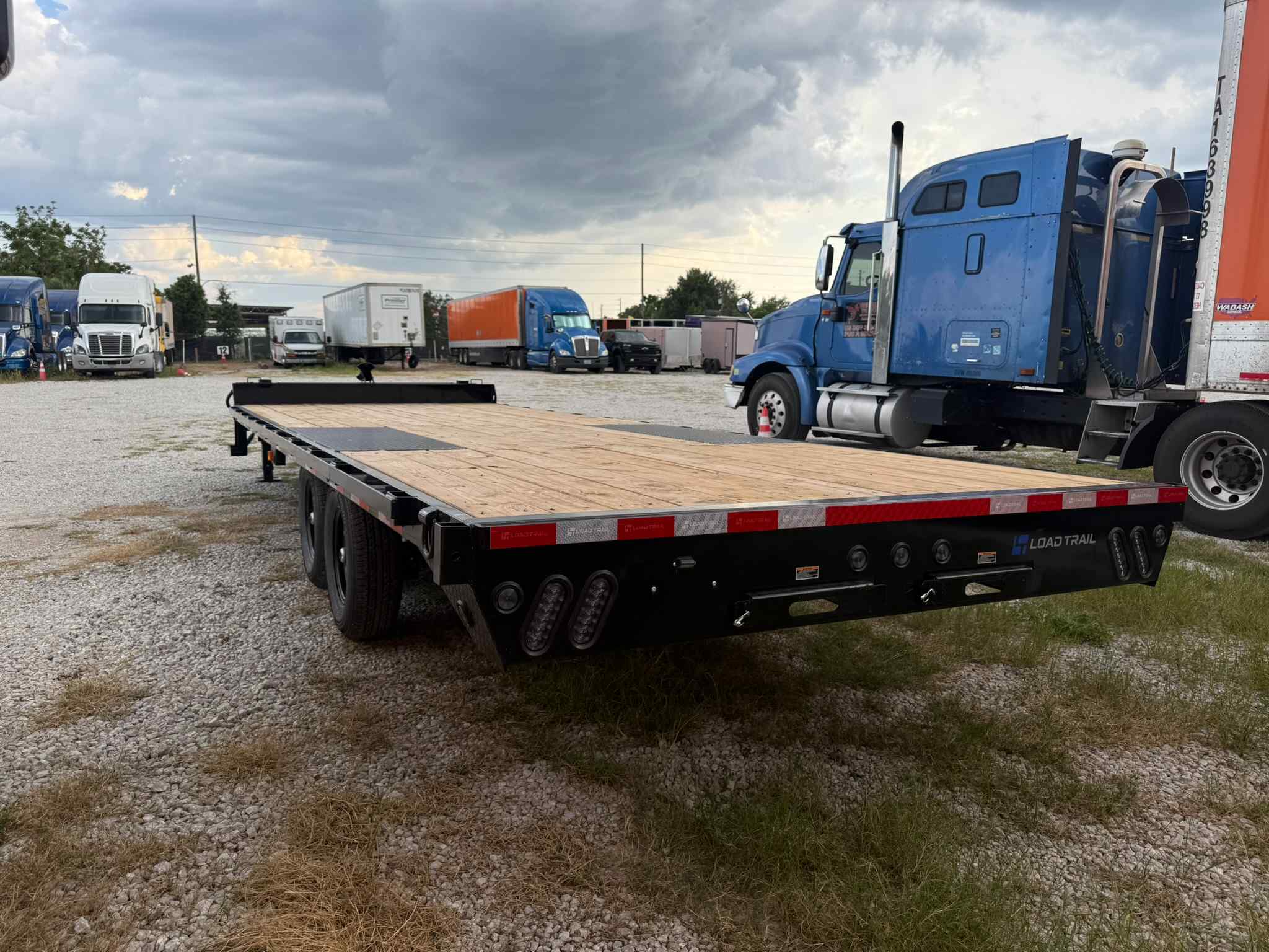 New 8.5×24 LOAD TRAIL Flatbed Trailer